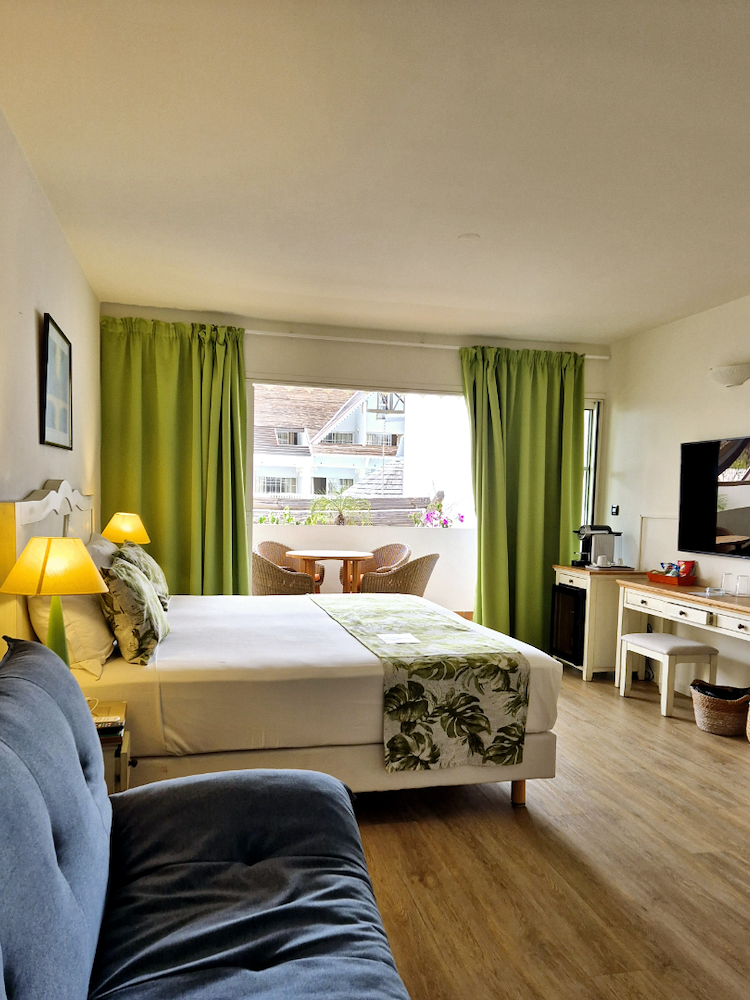 Junior Suite at Hotel Le Nautile: Spacious Comfort with Tropical Views